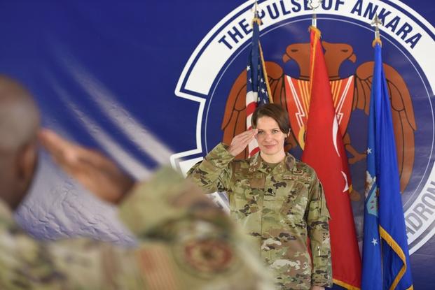U.S. Air Force Lt. Col. Manuela Peters renders her first salute as the new commander of the 717th Air Base Squadron, at the Ankara Support Facility, Türkiye, July 17, 2023. The 717th ABS supports Department of Defense personnel and their families in the region, the U.S. Embassy, Office of Defense Cooperation-Türkiye and tenant organizations in Ankara, Türkiye. (U.S. Air Force photo by Staff Sgt. Matthew Kakaris) U.S. Air Force Lt. Col. Manuela Peters renders her first salute as the new commander of the 717th Air Base Squadron, at the Ankara Support Facility, Türkiye, July 17, 2023.