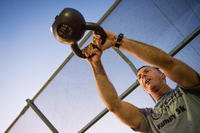 A Luke Thunderbolt performs a kettlebell swing at Luke Air Force Base, Arizona.